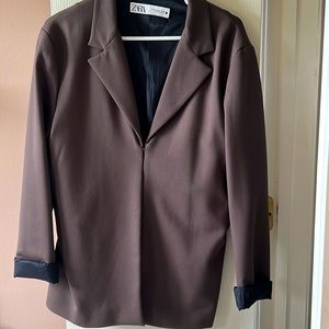 Olive office jacket with black cuffed sleeves size xxl but fits large - xl